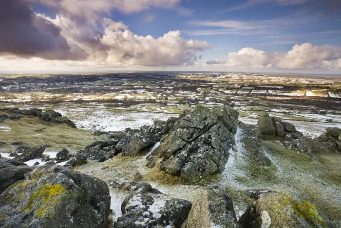 Framed Print : Sourton Tor backed by snow dusted countryside, Dartmoor National Park, Devon, England Framed Print : Sourton Tor backed by snow dusted countryside, Dartmoor National Park, Devon, England