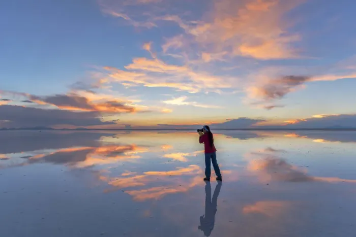 Framed Print : South America, Andes, Altiplano, Bolivia, Salar de Uyuni, woman taking pictures at sunset Framed Print : South America, Andes, Altiplano, Bolivia, Salar de Uyuni, woman taking pictures at sunset