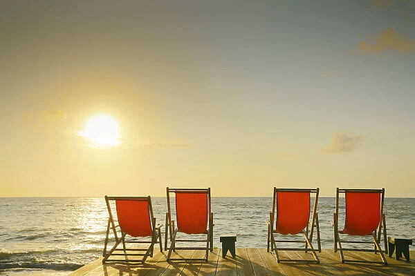 South America, Brazil, Alagoas, Praia do Patacho, sun loungers on a deck overlooking