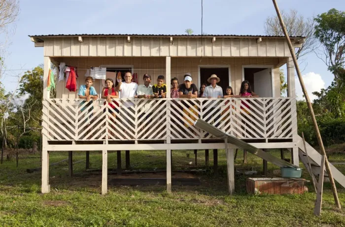 Framed Print : South America, Brazil, Amazonas, Gero Mesquita and a caboclo family stand on the balcony