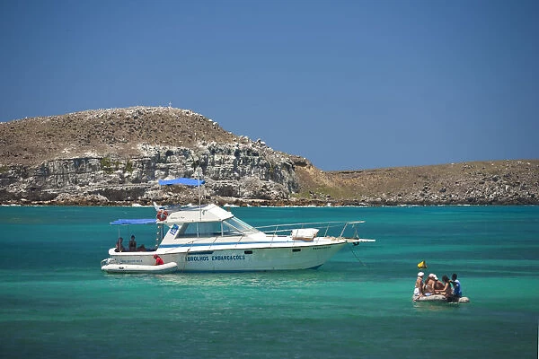South America, Brazil, Bahia, Abrolhos, dive boat on turquoise coral sea in the Abrolhos