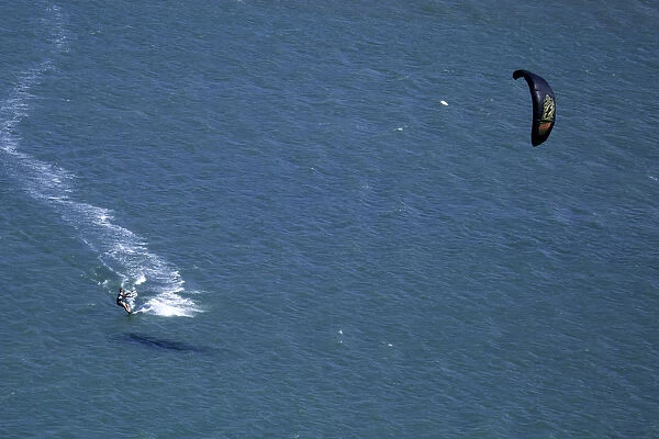 South America, Brazil, Ceara, Aerial picture of a kite surfer on the Atlantic coast