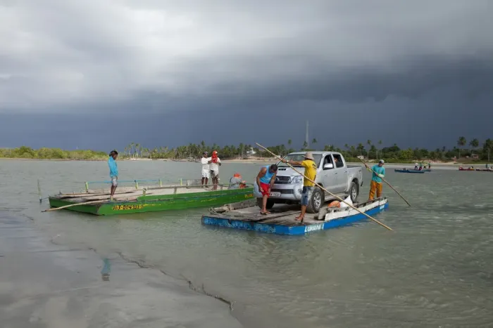 Framed Print : South America, Brazil, Ceara, Camocim, storm clouds over the ferry rafts at Guriu Framed Print : South America, Brazil, Ceara, Camocim, storm clouds over the ferry rafts at Guriu