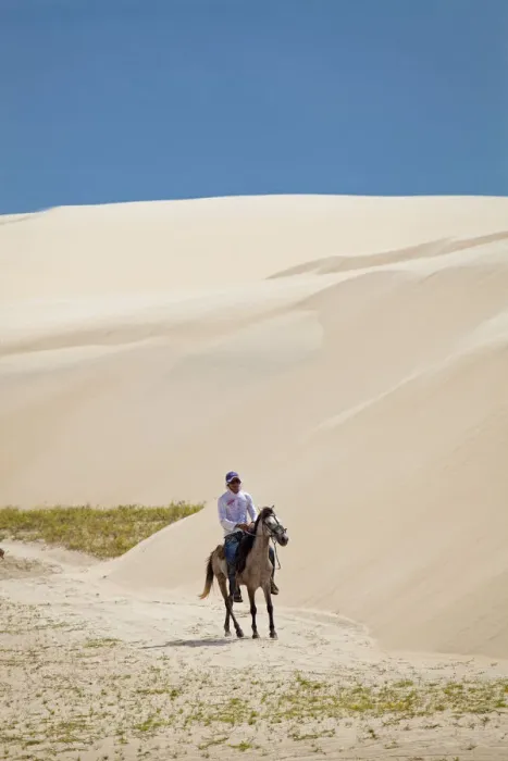Framed Print : South America, Brazil, Maranhao, horseman riding through the sand dunes in the pequenos Framed Print : South America, Brazil, Maranhao, horseman riding through the sand dunes in the pequenos