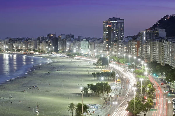 South America, Brazil, Rio de Janeiro, general view of Copacabana Beach at night showing