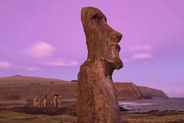 South America, Chile, Easter Island, Isla de Pascua, Moai stone human figures at sunset