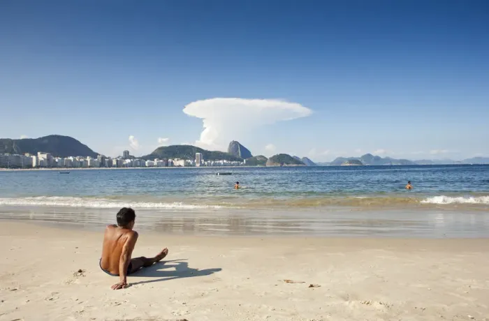 Framed Print : South America, Rio de Janeiro, Rio de Janeiro city, a sunbather at the end of Copacabana Framed Print : South America, Rio de Janeiro, Rio de Janeiro city, a sunbather at the end of Copacabana