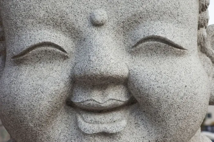 Framed Print : South Korea, Seoul, Jogyesa Temple, Facial Detail of Stone Buddha Carving