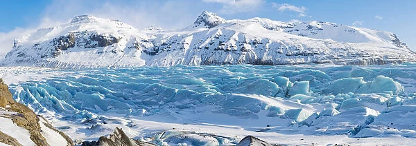 Southern Iceland, Europe. Panoramic view of a glacier in wintertime