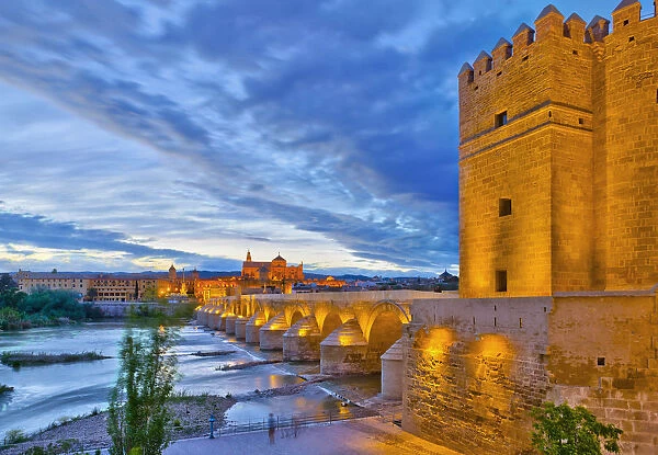 Spain, Andalucia, Cordoba Province, Cordoba, Roman Bridge (Puente Romano) over Guadalquivir River and Mezquita (Mosque‚AiCathedral of Cordoba, UNESCO World Heritage Site)