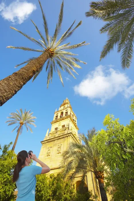 Framed Print : Spain, Andalucia, Cordoba, woman photographing La Mezquita cathedral, Low view (MR) Framed Print : Spain, Andalucia, Cordoba, woman photographing La Mezquita cathedral, Low view (MR)