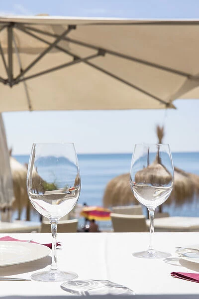 Spain, Andalusia, Malaga, Malagueta, Table on a terrace in a restaurant