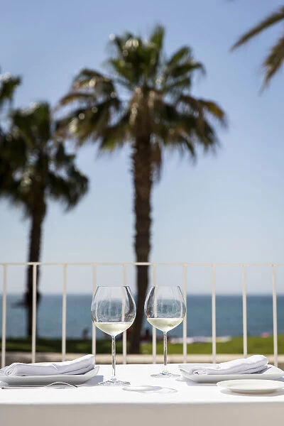 Spain, Andalusia, Malaga, Malagueta, Table of a restaurant on the beach