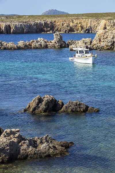 Spain, Balearic Islands, Menorca, Boat in Cala en Tosqueta
