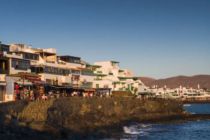 Framed Print : Spain, Canary Islands, Lanzarote, Playa Blanco, seafront view, dusk