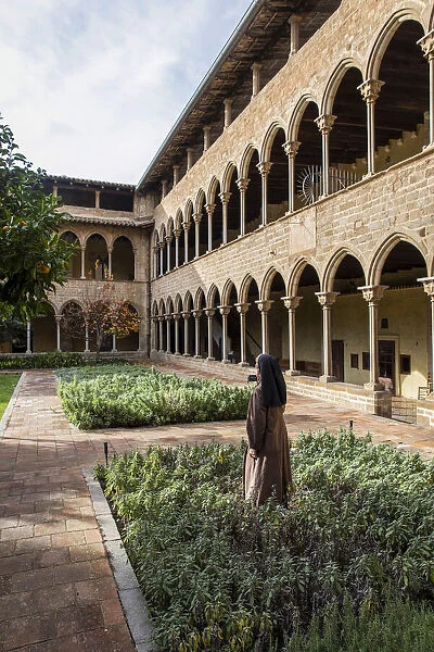 Spain, Catalonia, Barcelona, Pedralbes Monastery, An enclosed nun in the cloister