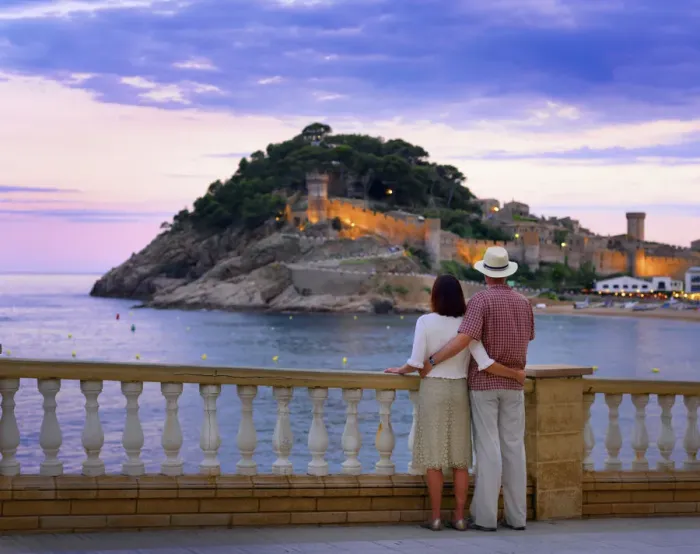 Framed Print : Spain, Catalonia, Costa Brava, Tossa de Mar, man and woman looking at view (MR) Framed Print : Spain, Catalonia, Costa Brava, Tossa de Mar, man and woman looking at view (MR)