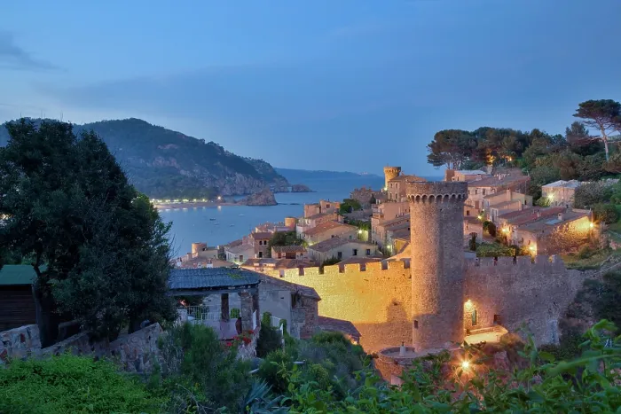 Framed Print : Spain, Catalonia, Tossa de Mar, The medieval walls of the Vila Vella (old town) lit up at night