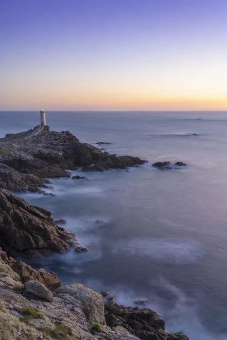 Framed Print : Spain, Galicia, Roncuda, overview of bay and lighthouse at dusk