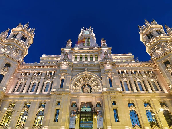 Spain, Madrid, Plaza de Cibeles, town hall building illuminated at night