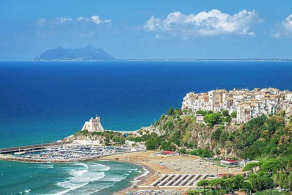 Sperlonga with the beach, the tower and the marina and the peak of Circeo mountain in the background, Sperlonga, Latium, Italy