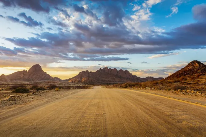 Framed Print : Spitzkoppe, Damaraland, Namibia, Africa. Gravel road to the granite peaks at sunset Framed Print : Spitzkoppe, Damaraland, Namibia, Africa. Gravel road to the granite peaks at sunset