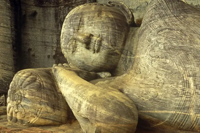 Framed Print : Sri Lanka, Polonnaruwa, Gal Vihara. A celebrated 14-metre long recumbent Buddha statue lies in the Gal Vihara, or Cave of the Spirits Framed Print : Sri Lanka, Polonnaruwa, Gal Vihara. A celebrated 14-metre long recumbent Buddha statue lies in the Gal Vihara, or Cave of the Spirits
