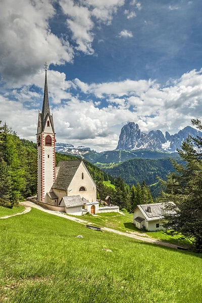 St. Jakob church with Langkofel - Sassolungo mountain group in the background, Ortisei - St
