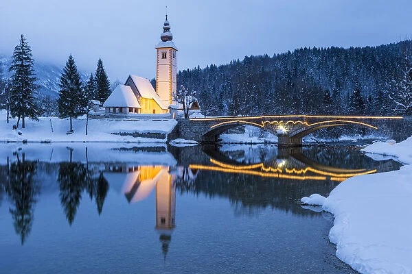 St. Johns Church and bridge on the shore of Lake Bohinj, Slovenia