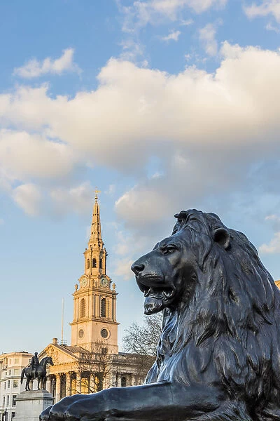 St Martin in the Fields church and Lion statues in Trafalgar Square, London, England