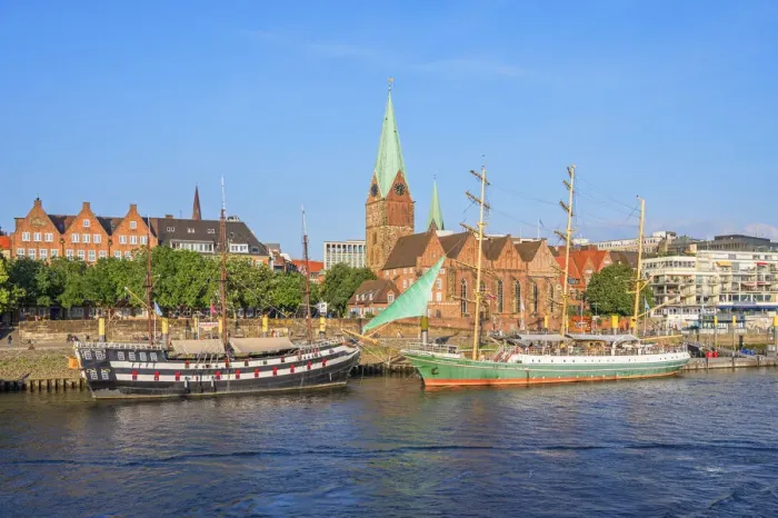 Framed Print : St. Martinis church and sailboats on river Weser, Bremen, Germany Framed Print : St. Martinis church and sailboats on river Weser, Bremen, Germany