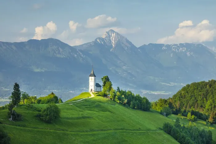 Framed Print : St. Primoz Church with Kamnik-Savinja Alps, Jamnik, Gorenjska, Slovenia, Europe Framed Print : St. Primoz Church with Kamnik-Savinja Alps, Jamnik, Gorenjska, Slovenia, Europe