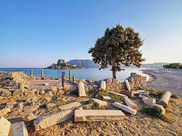 St. Stefanos Basilica Ruins and Kastri Island at sunset, Agios Stefanos Beach, Kos Island, Dodecanese, Greece
