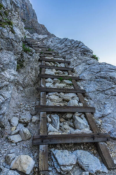 Staircase on steep mountain ridge on path to Rifugio Zsigmondy Comici hutte