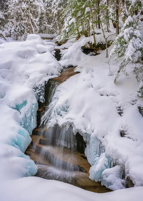 Framed Print : Stairs Falls in winter with blue ice, Falling Waters Trail, Franconia Notch State Park, White Mountain National Forest, New Hampshire, USA Framed Print : Stairs Falls in winter with blue ice, Falling Waters Trail, Franconia Notch State Park, White Mountain National Forest, New Hampshire, USA