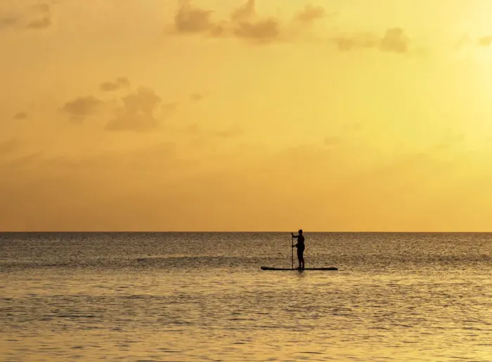 Framed Print : Stand up paddle along Seven Mile Beach at sunset, George Town, Grand Cayman Framed Print : Stand up paddle along Seven Mile Beach at sunset, George Town, Grand Cayman