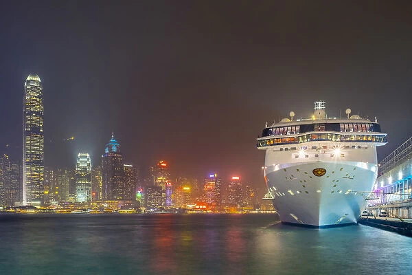 Star Cruises cruiseliner at Ocean Terminal cruise terminal and buildings on Hong Kong
