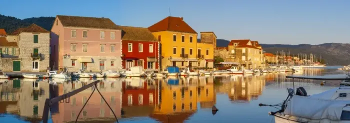 Framed Print : Stari Grad (Old Town) refelcted in harbour, Stari Grad, Dalmatia, Croatia Framed Print : Stari Grad (Old Town) refelcted in harbour, Stari Grad, Dalmatia, Croatia