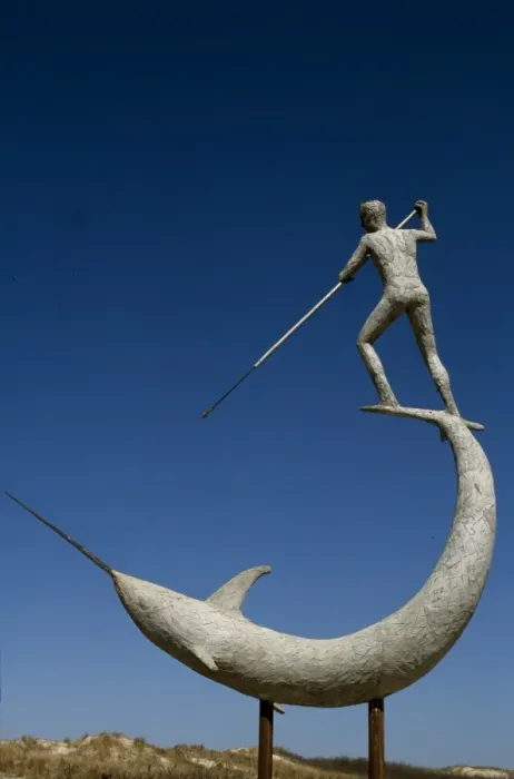 Framed Print : A statue of Narwhal being speared at Menemsha Harbour