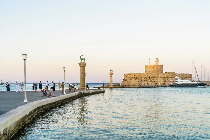 Framed Print : The statues of the Myth Colossus of Rhodes at the Mandraki Marina and Port looking towards Saint Nicholas Fortress, Rhodes Town, Rhodes, Dodecanese Islands, Greece Framed Print : The statues of the Myth Colossus of Rhodes at the Mandraki Marina and Port looking towards Saint Nicholas Fortress, Rhodes Town, Rhodes, Dodecanese Islands, Greece