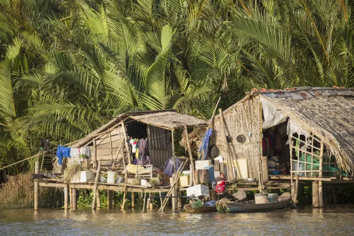 Framed Print : Stilt house on Ben Tre River, Ben Tre, Mekong Delta, Vietnam Framed Print : Stilt house on Ben Tre River, Ben Tre, Mekong Delta, Vietnam