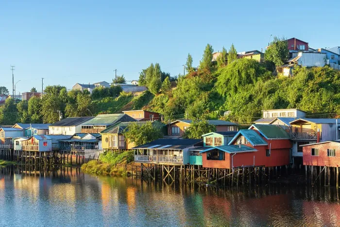 Framed Print : Stilt houses called Palafitos on Pedro Montt at sunrise, Castro, Chiloe Island, Chiloe Province, Los Lagos Region, Chile