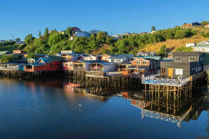 Framed Print : Stilt houses called Palafitos on Pedro Montt at sunrise, Castro, Chiloe Island, Chiloe Province, Los Lagos Region, Chile