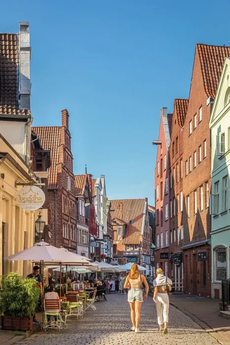 Framed Print : Stintmarkt in the old town with street restaurants, Luneburg, Lower Saxony, Germany Framed Print : Stintmarkt in the old town with street restaurants, Luneburg, Lower Saxony, Germany