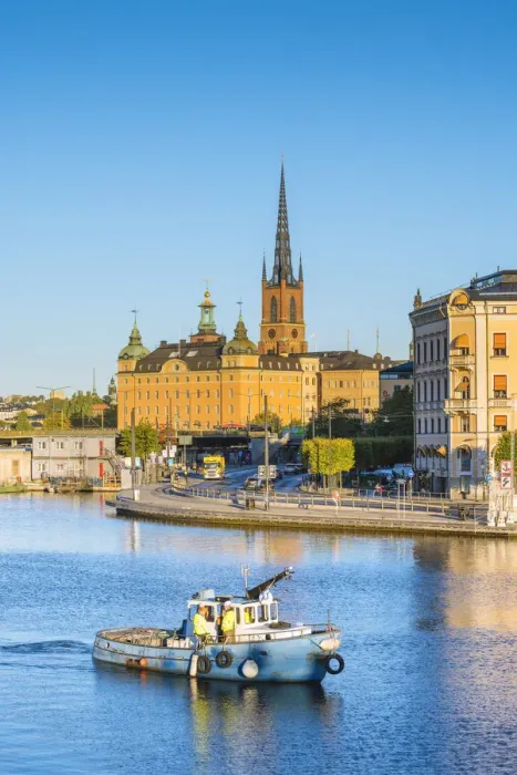 Framed Print : Stockholm, Sweden, Northern Europe. Fishing boat passing in front of Riddarholmen Framed Print : Stockholm, Sweden, Northern Europe. Fishing boat passing in front of Riddarholmen