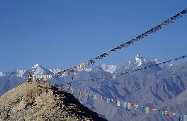 Stok Mountains and prayer flags viewed from Leh