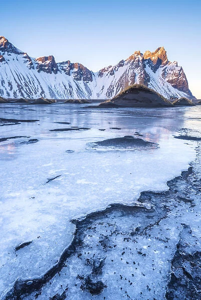 Stokksnes, Eastern Iceland, Europe. Vestrahorn mountain in a frozen winter landscape