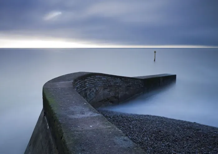 Framed Print : Stone jetty on the seafront at Sidmouth, Devon, England. Winter Framed Print : Stone jetty on the seafront at Sidmouth, Devon, England. Winter
