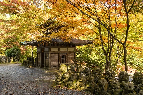 Stone statues at Otagi Nenbutsu ji Temple in Autumn, Arashiyama Sagano area, Kyoto, Japan