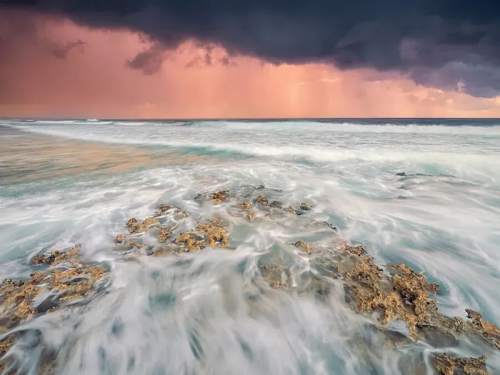 Framed Print : Storm clouds at daybreak on the Caribbean Sea along the rugged ironshore of Grand Cayman in the Cayman Islands, British West Indies Framed Print : Storm clouds at daybreak on the Caribbean Sea along the rugged ironshore of Grand Cayman in the Cayman Islands, British West Indies